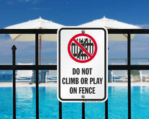 Do not climb fence sign