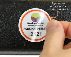 Mirror decals with aggressive adhesive