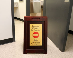 Restroom Closed for Cleaning Bilingual FloorBoss Elite Floor Sign