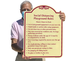 Social distancing rules sign for a playground