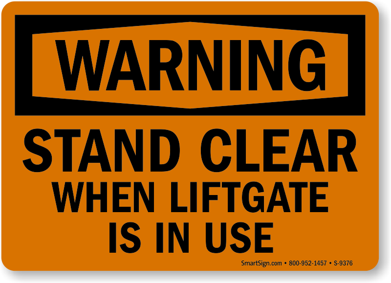 Stand clear. Warning Liftgate open. Caution Stand Clear while in use. Stand Clear of the Blast Door.
