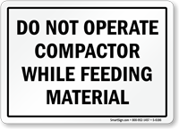 Do Not Operate Compactor While Feeding Material Sign
