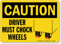 Driver Must Chock Wheels Caution Sign