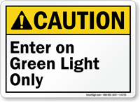 Enter On Green Light Only Caution Sign
