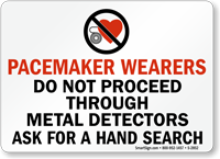 Pacemaker Wearers Do Not Proceed Sign