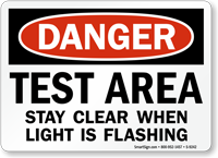 Stay Clear When Light Is Flashing Sign
