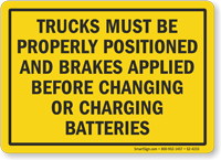Trucks Must Be Properly Positioned Before Charging Sign