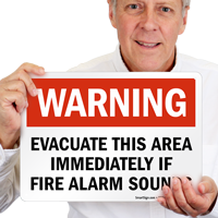 Warning Evacuate This Area Sign