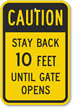 Stay Back 10 Feet Until Gate Opens Sign