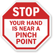 STOP: Your hand is near Pinch point sign