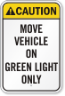 Move Vehicle On Green Light Only Caution Sign
