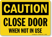 Caution Close Door In Use Sign