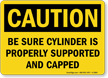 Caution Be Sure Cylinder Supported Sign
