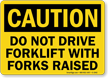 Do Not Drive Forklift With Forks Raised Sign