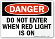 Danger Do Not Enter When Red Light is On Sign