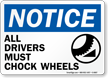 Notice Drivers Chock Wheels Sign