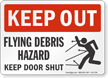 Flying Debris Hazard Keep Door Shut Keep Out Sign