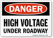 High Voltage Under Roadway Danger Sign