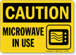 Microwave In Use Caution Sign