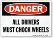Danger Drivers Chock Wheels Sign