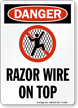 Razor Wire On Top OSHA Danger Sign