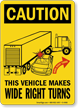 Caution Vehicle Makes Wide Right Turns Sign