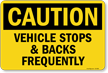 Vehicle Stops And Backs Frequently OSHA Caution Sign
