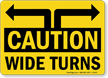 Caution Wide Turns Sign