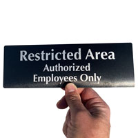Restricted authorized employees only Sign made from durable anodized aluminum