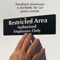 Restricted authorized employees only Sign
