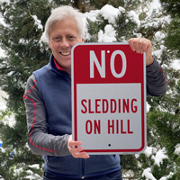 No sledding on hill sign