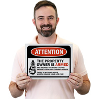 Property protection with armed owner signs