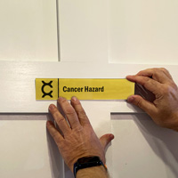Cancer Hazard Sign on a Door