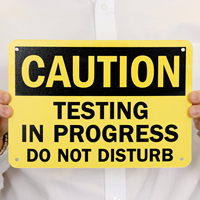Caution Testing In Progress Sign
