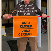 Area closed bilingual door barricade sign