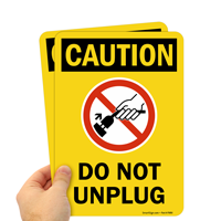 Caution: Do not unplug - contains vaccine sign