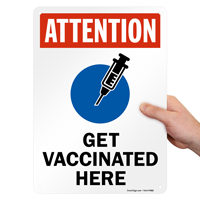 Attention: Get vaccinated here sign