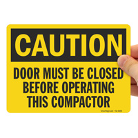 OSHA Caution Sign: Close Door Before Operating Compactor