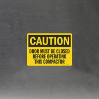 Compactor Safety Reminder: Close Door Before Operation