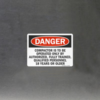 Compactor Operation: Authorized Personnel Sign"