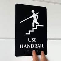 Use handrail braille sign