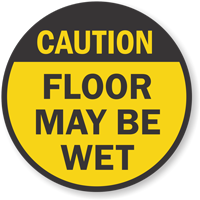 Circular caution sign for wet floors