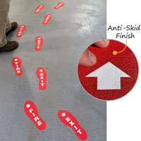 Show the way to a fire exit with footprints