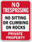 No Sitting Or Climbing On Rocks Sign