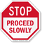 Proceed Slowly Stop Sign
