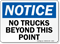 No Trucks Beyond Point Sign