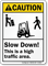 Slow Down High Traffic Area Caution Sign